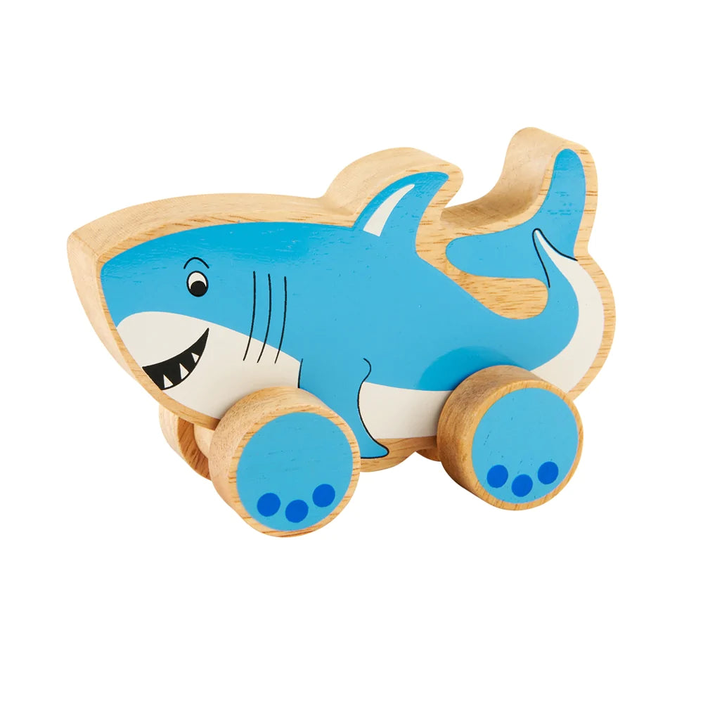 Lanka Kade Shark Push Along Toy. This fab blue and white Shark toy is handcrafted from sustainable rubber wood and is perfect for small hands - great for imaginative play. Say It Baby Gifts