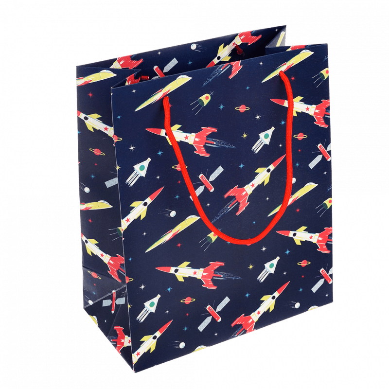 Small paper gift bag with red string handles and space age design by Rex London.