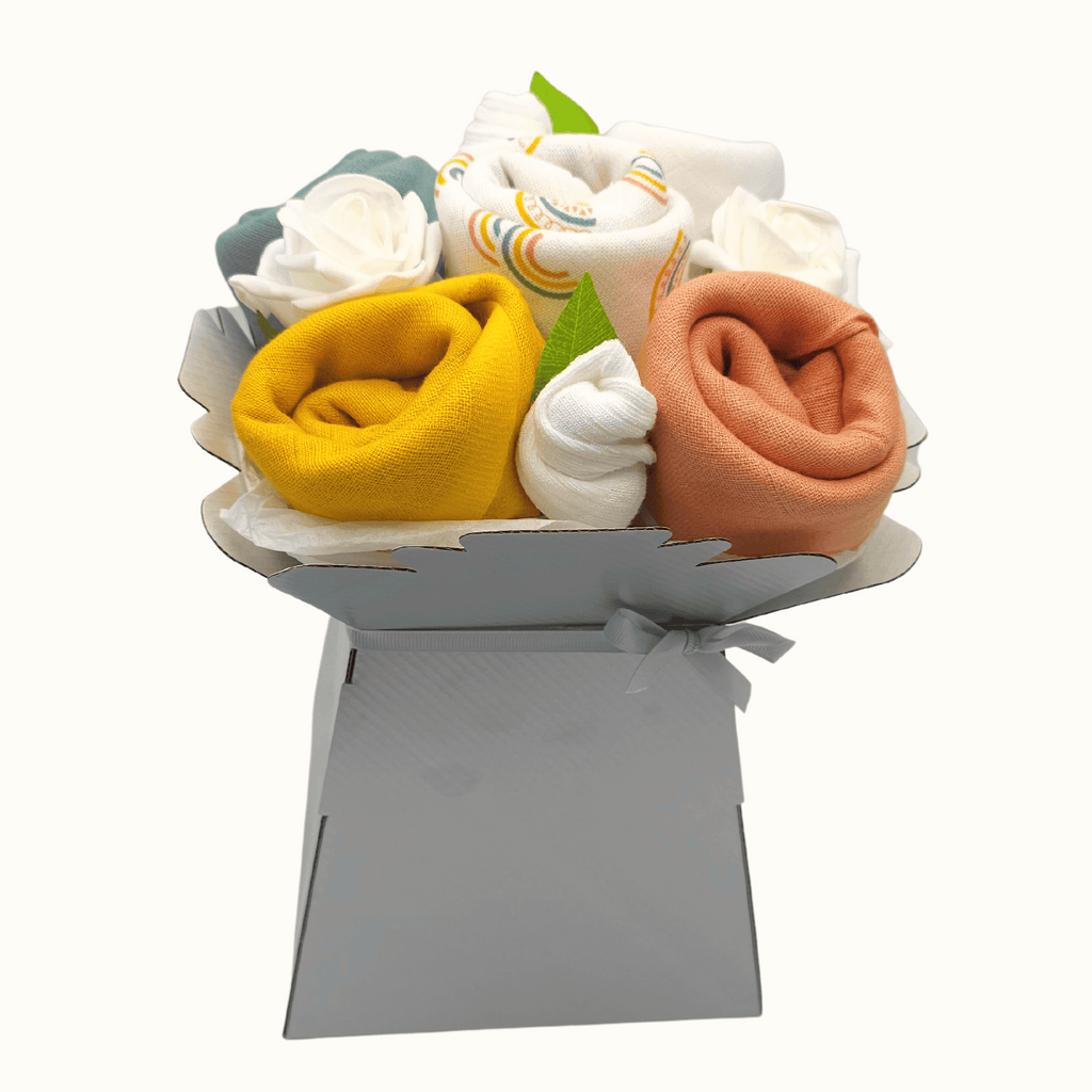 Say It Baby - Scandi Rainbow Baby Muslin Square Bouquet. This lovely scandi themed bouquet is part of our Muslin Square Bouquet range. Sold by Say It Baby Gifts